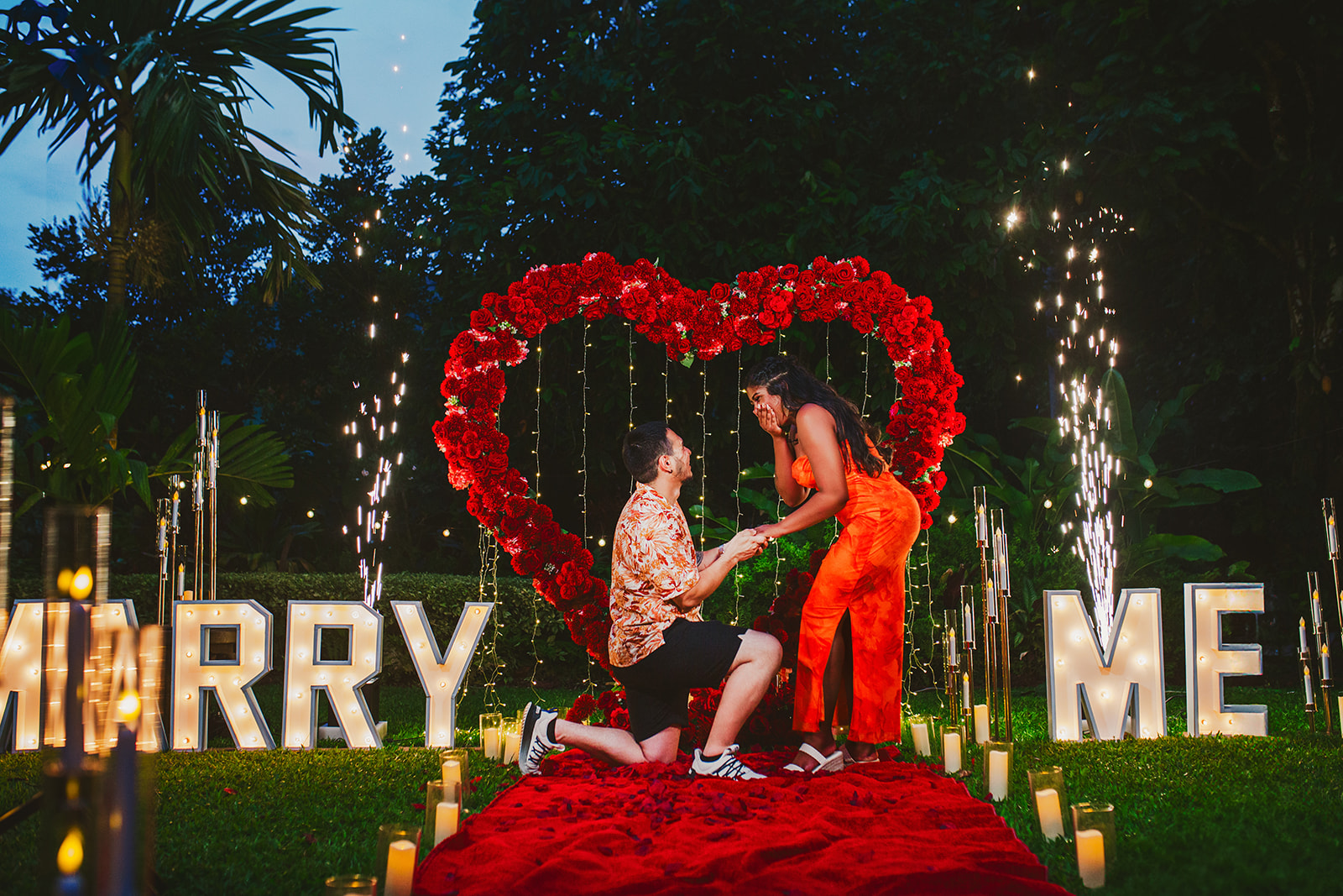 Red heart Arch Proposal with Marry me Letters in Trinidad